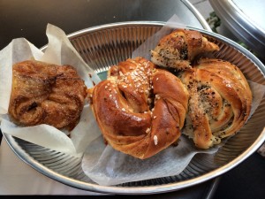 Kouign amann, cinnamon bun, and cardamom bun