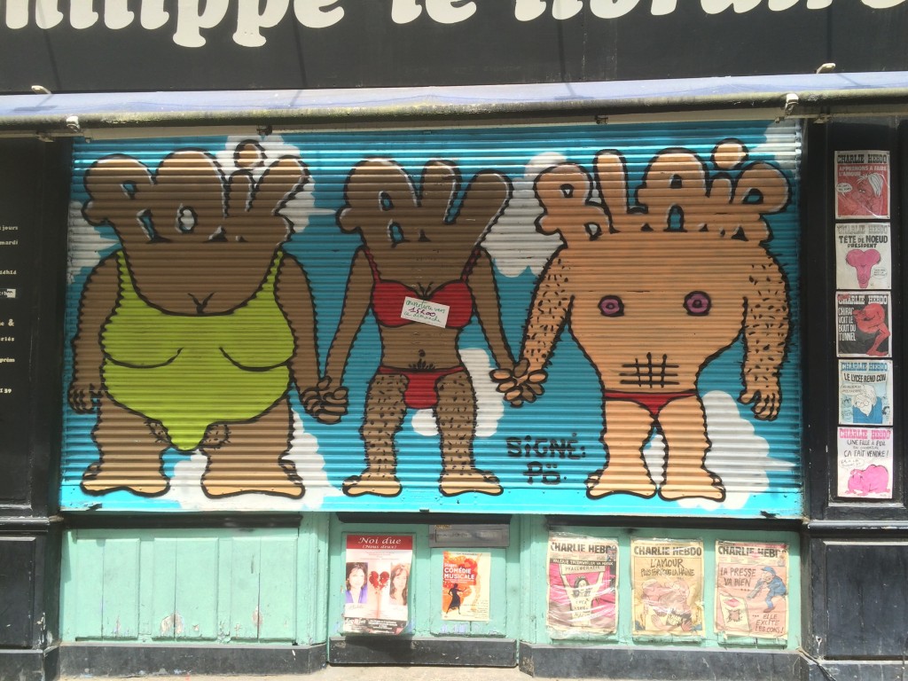 Paris street art muscle men