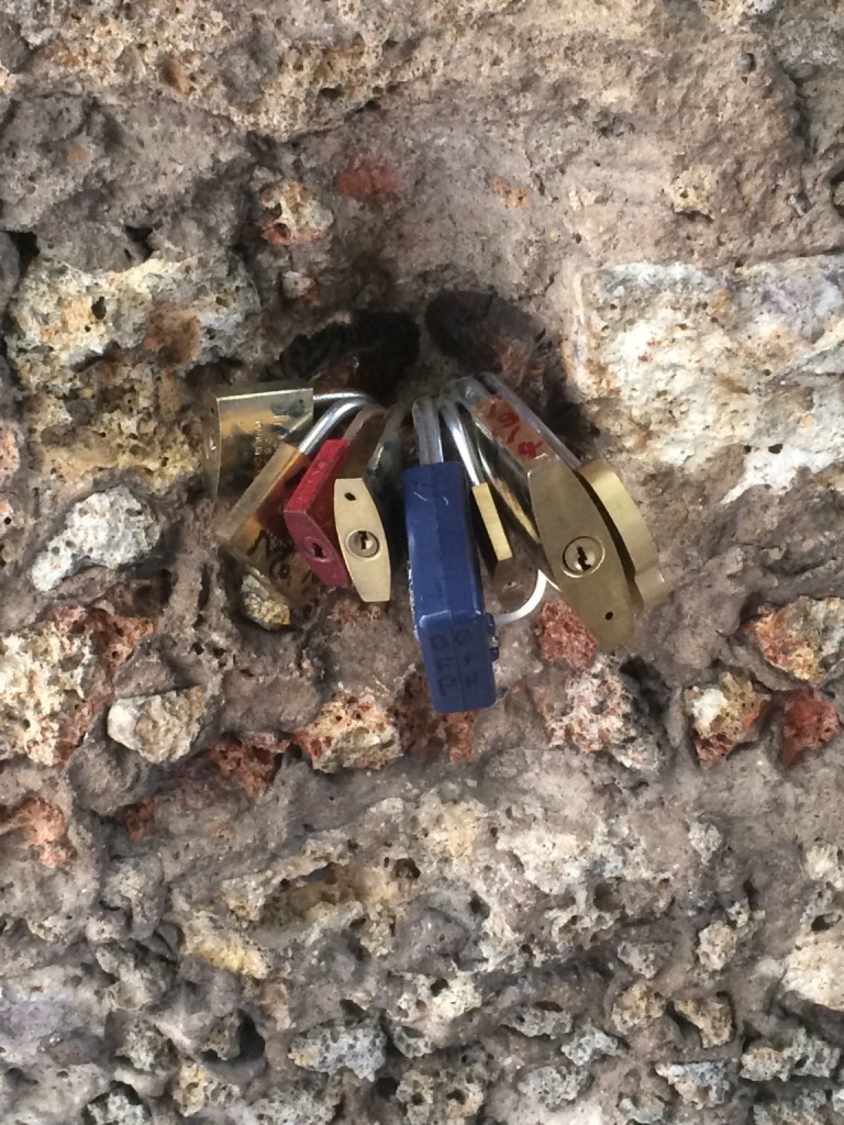 Love locks on the under side of a paris bridge