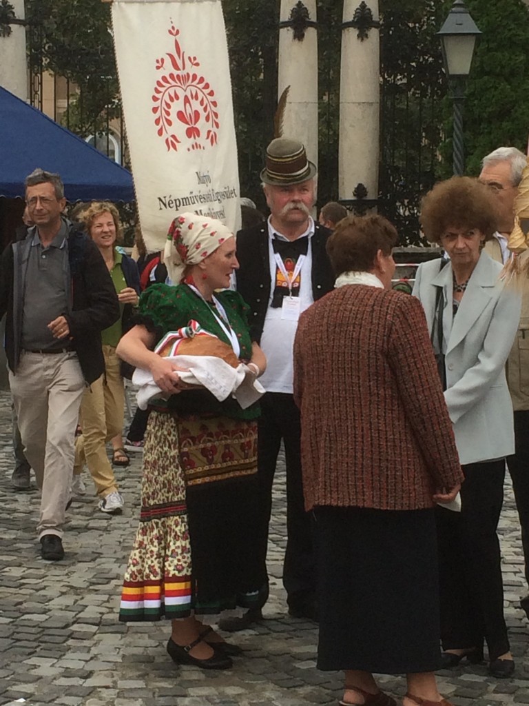 Best hat and mustache at the event.  Also, there's a loaf of bread that's about to be blessed.